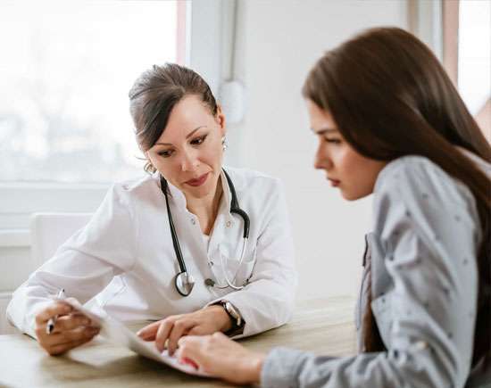 A compassionate counselor reviewing a plan with a young individual, symbolizing support and understanding in bereavement services.